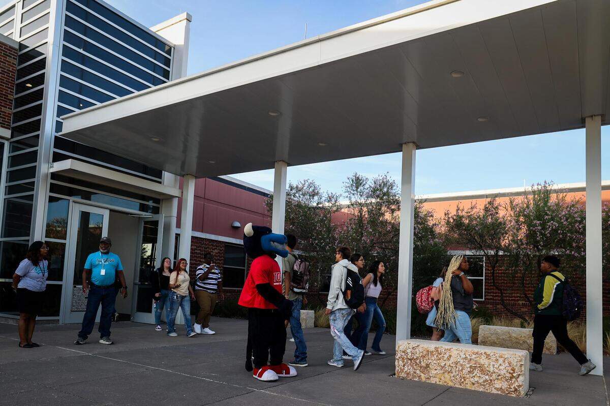 Students arrive to campus on the first day of school for Fort Worth ISD last year on Aug. 15, 2022, at TCC South/FWISD Collegiate High School.