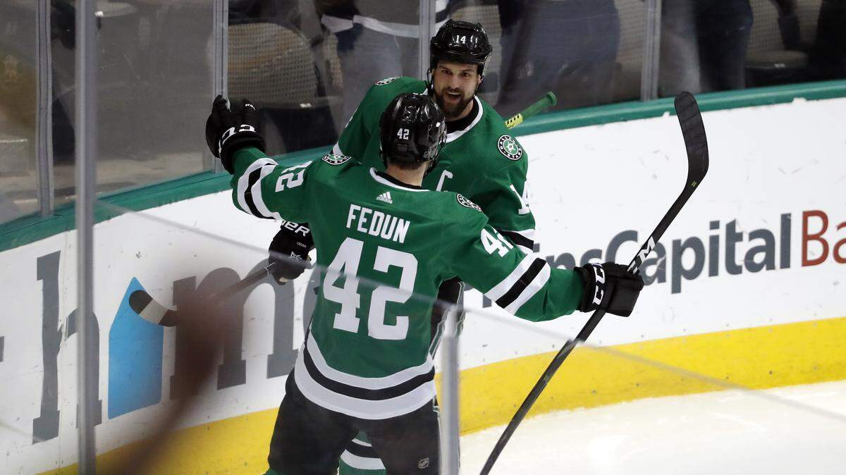 Stars defenseman Taylor Fedun, left, and left wing Jamie Benn celebrate a goal by Benn during the first period Wednesday in Dallas against the Buffalo Sabres.