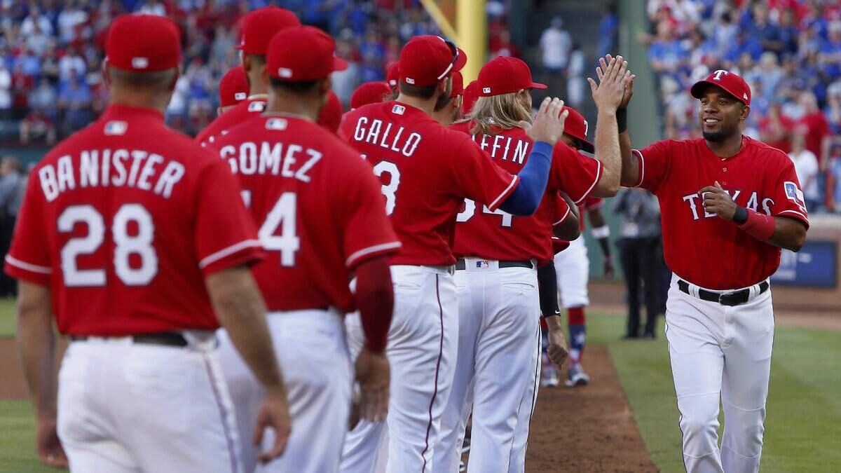 Texas Rangers shortstop Elvis Andrus, right, is introduced before last season's Opening Day game against the Cleveland Indians at Globe Life Park in Arlington.