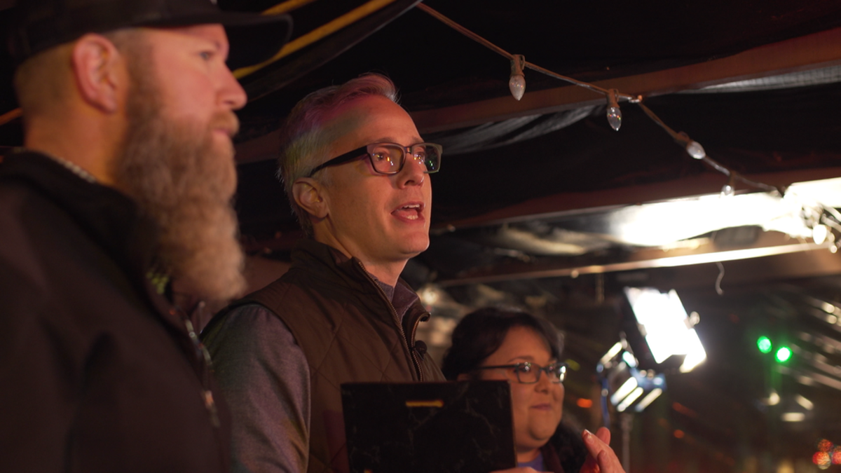 Chef Chad M. Burnett, left, and WFAA/Channel 8 reporter David Schechter hosted the Tamale Throwdown at Lee Harvey’s in Dallas.
