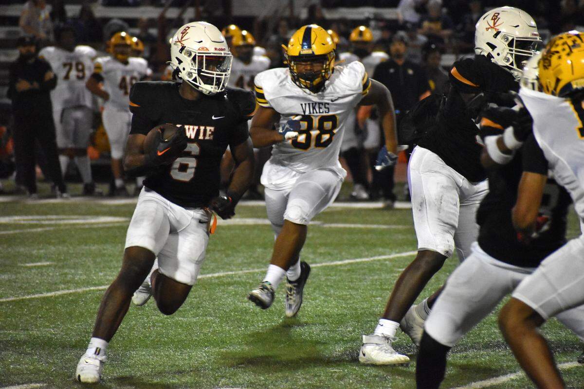 Arlington Bowie running back Darrion Bowers runs the ball against Arlington Lamar in the third quarter of a UIL football game at C.H. Wilemon Field on Friday, Nov. 1, 2024.