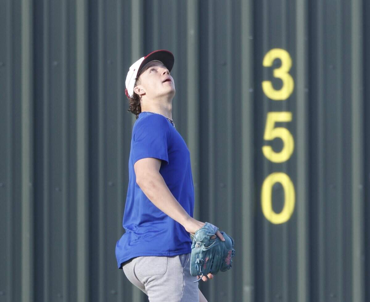 Luke Esquivel keeps an eye on a pop fly at the wall during Grapevine Mustang baseball practice at Grapevine High School in Grapevine, Texas, Tuesday Feb. 17, 2026.