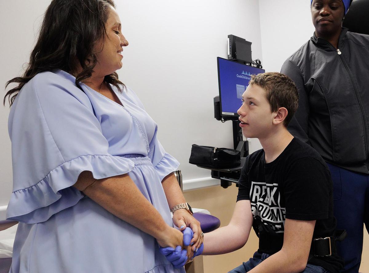 Preston Benjaman-Sewell and his mother, Meghan Czarobski, attend a doctors appointment at Cook Children’s Dodson Specialty Clinics on Tuesday, June 24, 2025, in Fort Worth.