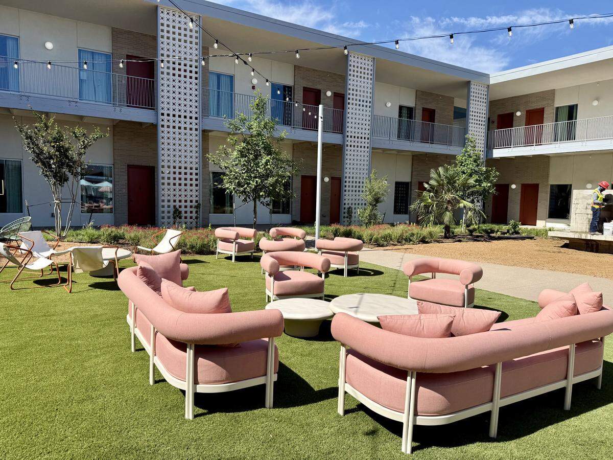 The patio and courtyard at the retro Caravan Court Hotel, Valencia Hotel Collection in Arlington, Texas, as seen June 1, 2026.