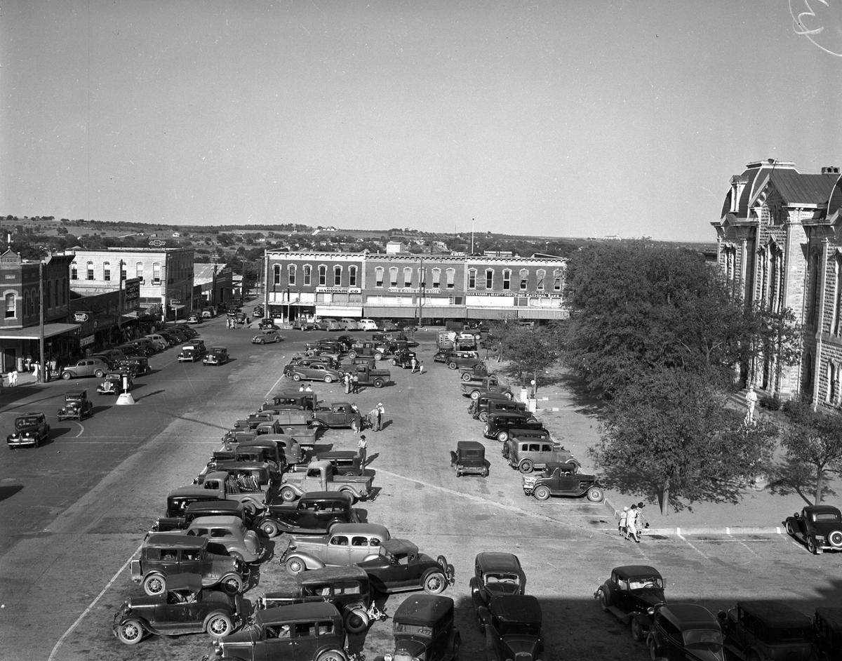 July 8, 1939: At Trading Day in Weatherford, Texas, parked cars of buyers around markets on a Saturday.