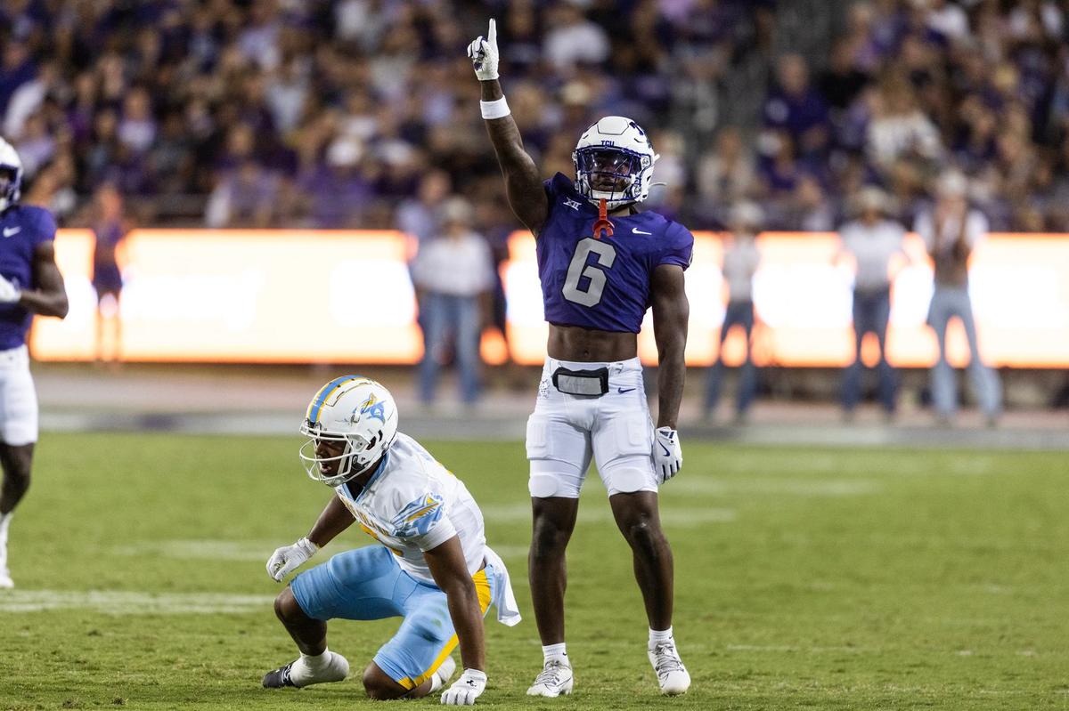 TCU cornerback LaMareon James (6) celebrates after tackling LIU wide receiver Cory Nichols (6) in the second quarter of a non-conference NCAA game between Long Island University and Texas Christian University at Amon G Carter Stadium in Fort Worth on Saturday.