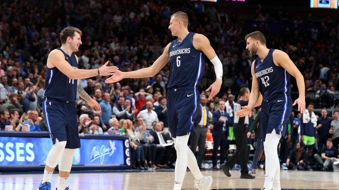 Dallas Mavericks’ Luka Doncic, left, Kristaps Porzingis, center, and Maxi Kleber are all scheduled to join the team in Orlando on July 8 as the NBA moves forward with the bubble concept to resume the 2019-20 season.