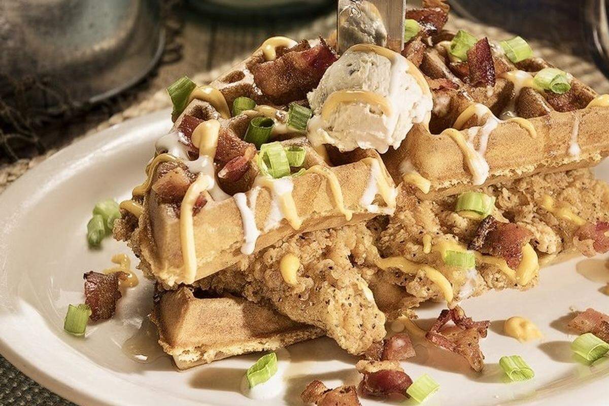 Stacked chicken and waffles at Huckleberry’s restaurants.