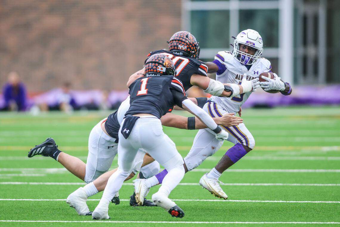 The Springtown defense hems in Alvarado running back Demarcus Belton during a Class 4A Division I regional semifinal Friday, Nov. 28, 2025, at Knight Stadium at Eagle Mountain High School in Fort Worth.