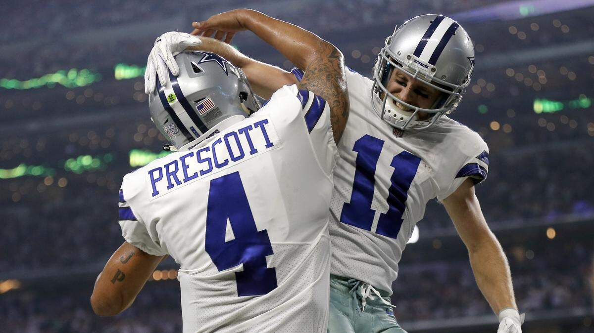 Dallas Cowboys’ receiver Cole Beasley, right, with quarterback Dak Prescott, sprained his foot during Thursday’s 13-10 win over the New Orleans Saints. Jason Garrett said he’s hopeful it’s not a long-term injury. The Cowboys don’t play again until Dec. 9.