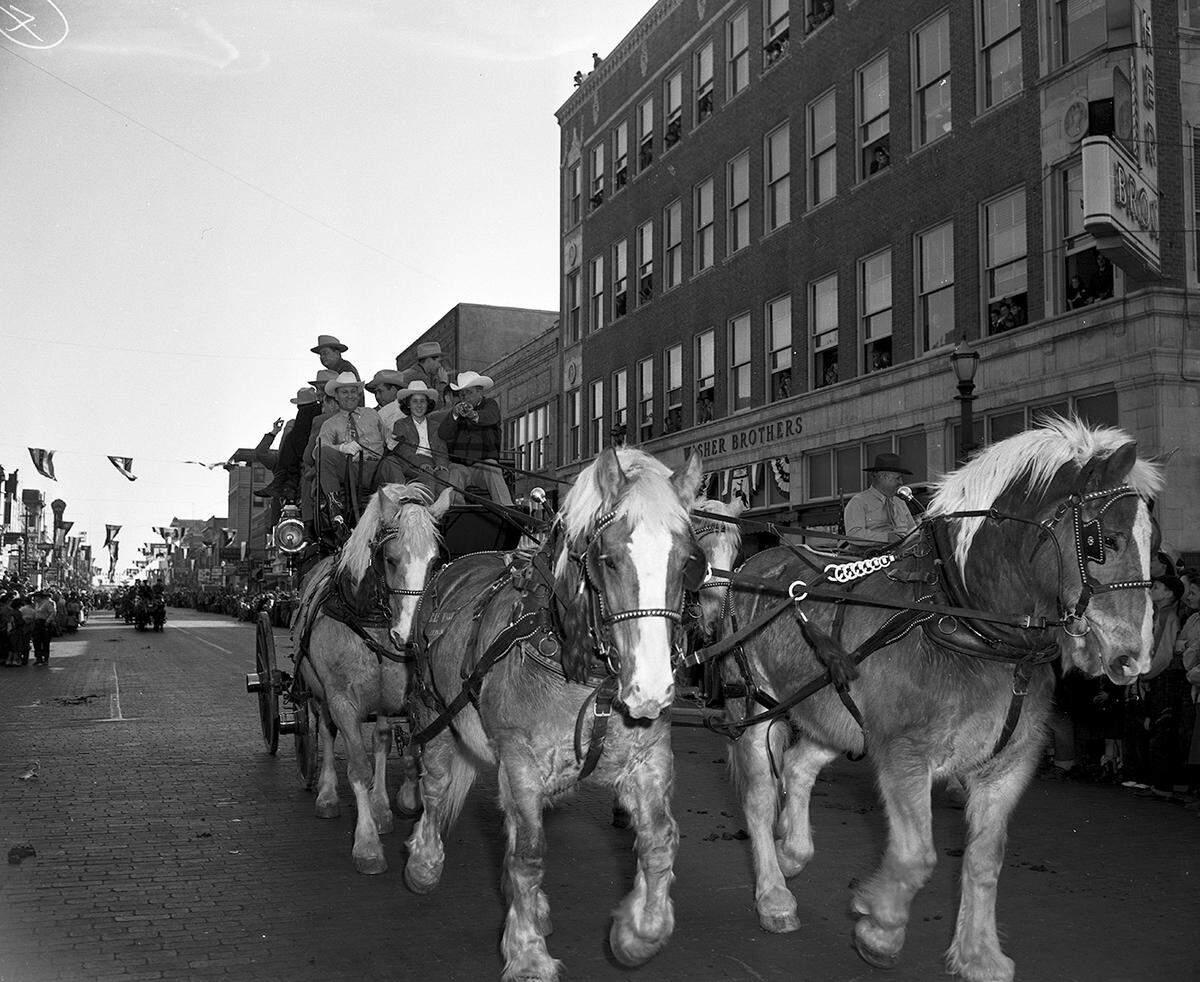 Jan. 26, 1951: Crack riding groups from West Texas participate along with various Fort Worth organizations and residents in the Southwestern Exposition and Fat Stock Show Parade. The tallyho loaded with passengers belong to Ray Woods of Fort Worth.