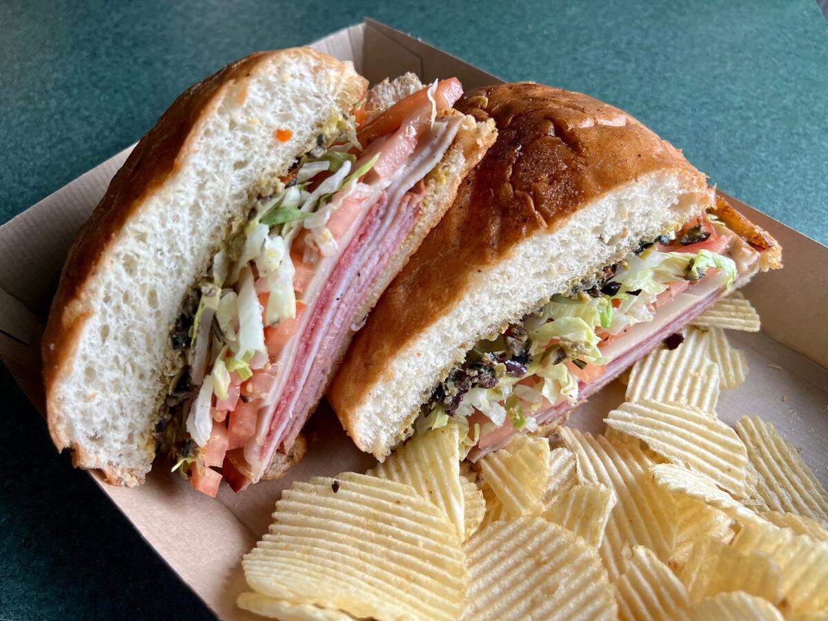The muffuletta is a featured sandwich at Colossal Sandwich Shop.