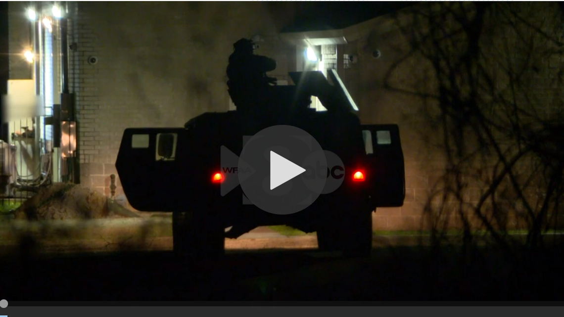 Exclusive video taken by WFAA-TV photographer Josh Stephen shows at least some of the hostages running out of a door at the synagogue just before FBI agents enter the building. The footage, shot just before 9:15 p.m., shows a man who appears to be holding a gun following the hostages as they escape, then almost immediately going back inside.