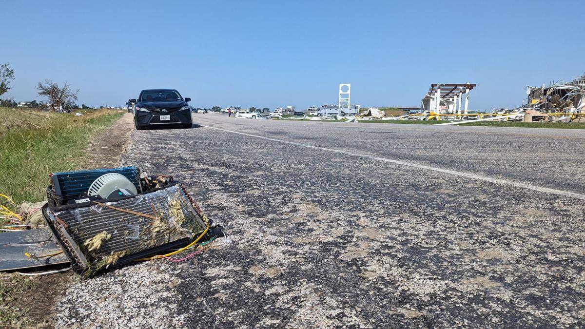 Debris on Lone Oak Road near Interstate 35 in Valley View, Texas, on Sunday, May 26, 2024, after severe storms hit Cooke County on Saturday. The Sheriff’s Office said 60 to 80 people took shelter in a nearby gas station.