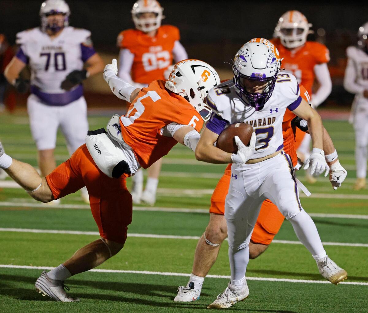 Celina defensive back Jacob Brown (6) misses a tackle on Alvarado wide receiver Logan Bjork (13) during the UIL 4A D1 Quarterfinals at Mustang-Panther Stadium in Grapevine, Texas, Friday, Dec. 06, 2024.
