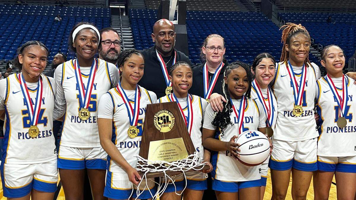 The Fort Worth Boswell Pioneers pose for a photo with the Class 6A Division II state championship after a 51-42 victory over Fort Bend Hightower at the Alamodome in San Antonio on Saturday, March 1, 2025.