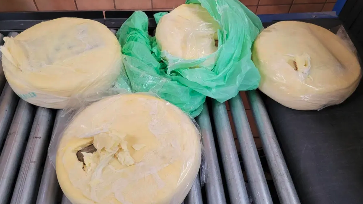 More than 17 pounds of cocaine was found hidden inside four cheese wheels smuggled across the United States border from Mexico, officials say.