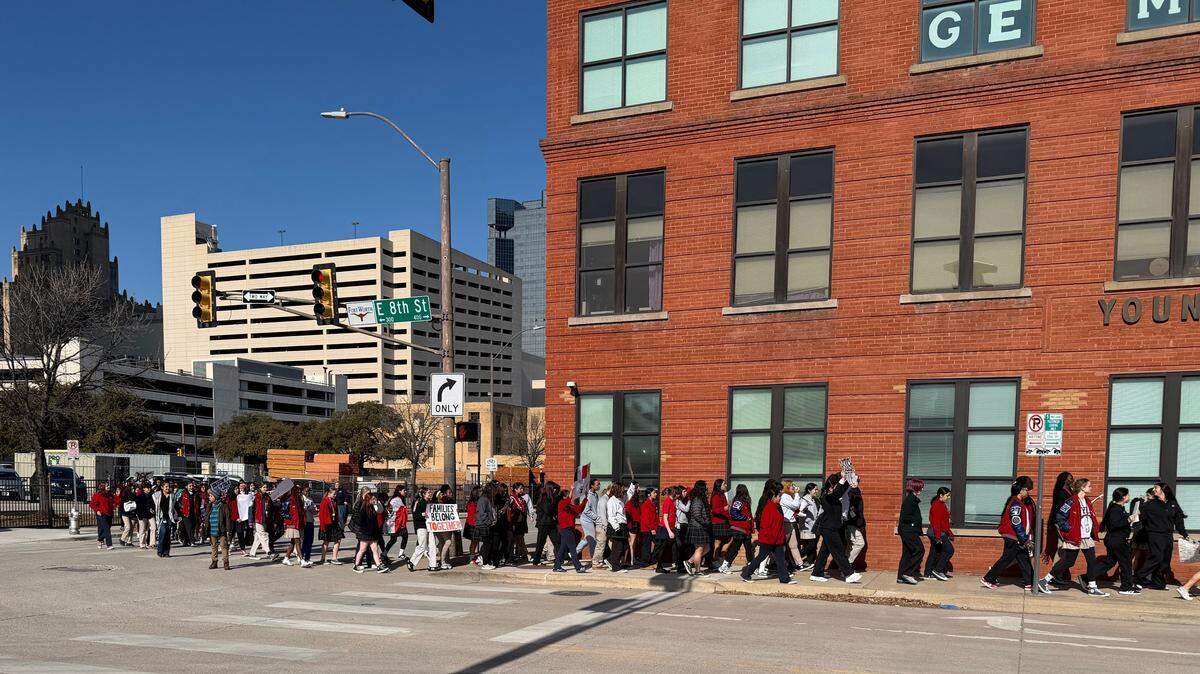 Students at the Young Women’s Leadership Academy in downtown Fort Worth organized a walk-out Friday morning, Jan. 30, 2026, to protest recent shooting deaths by U.S. Immigration and Customs and Enforcement agents.