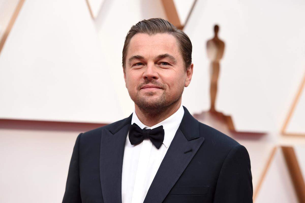 FILE - In this Feb. 9, 2020, file photo, Leonardo DiCaprio arrives at the Oscars in Los Angeles. DiCaprio is helping to launch the $12 million America’s Food Fund aimed at helping low-income families, the elderly and those whose jobs have been disrupted by the coronavirus pandemic. Among those teaming up for the launch are philanthropist Laurene Powell Jobs, Apple and the Ford Foundation. (Photo by Jordan Strauss/Invision/AP, File)