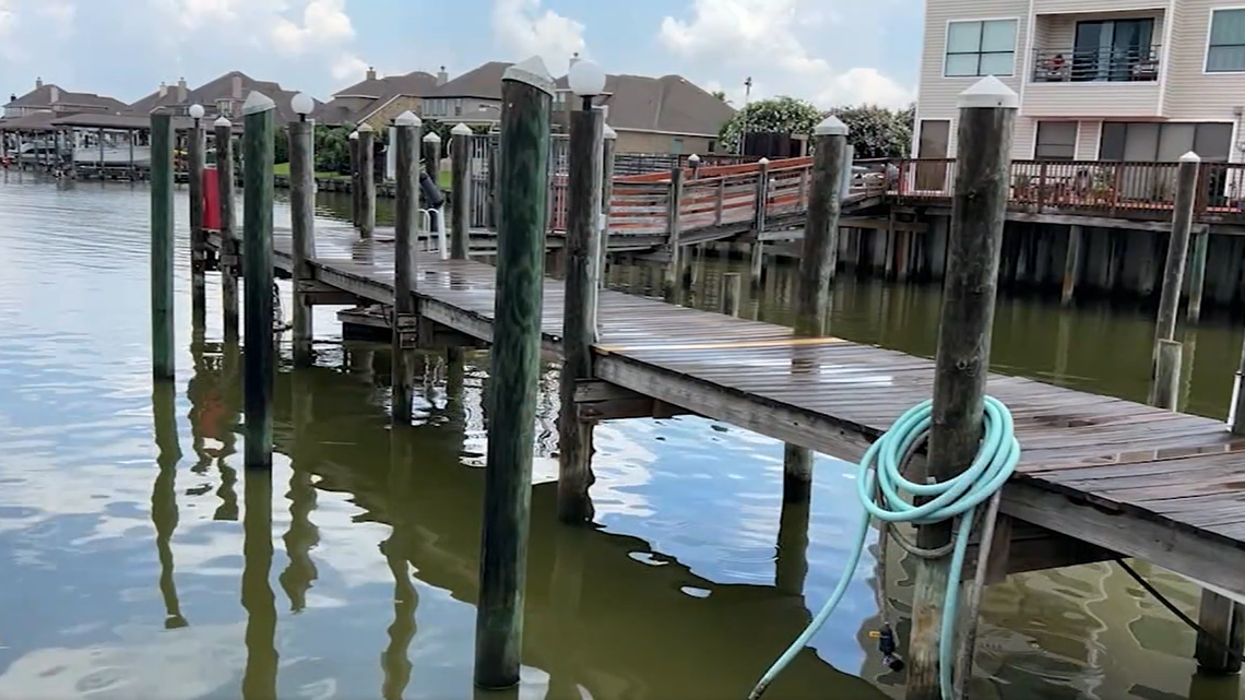 A woman found dead, hanging from a rope at a dock, was killed and placed there to look like a suicide, League City, Texas, police say.