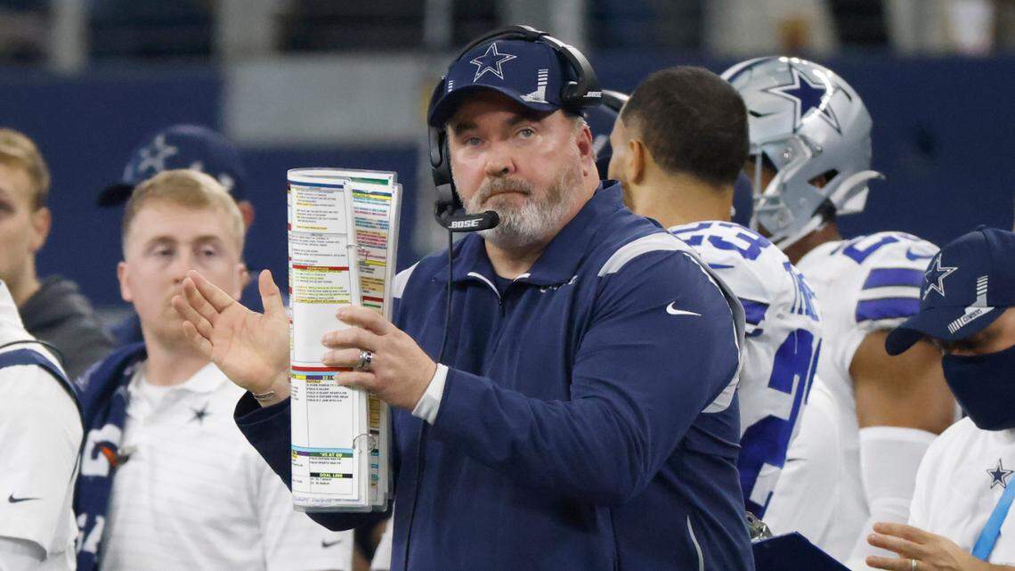 Dallas Cowboys head coach Mike McCarthy watches during the first half of an NFL wild-card playoff football game against the San Francisco 49ers in Arlington, Texas, Sunday, Jan. 16, 2022. (AP Photo/Ron Jenkins)