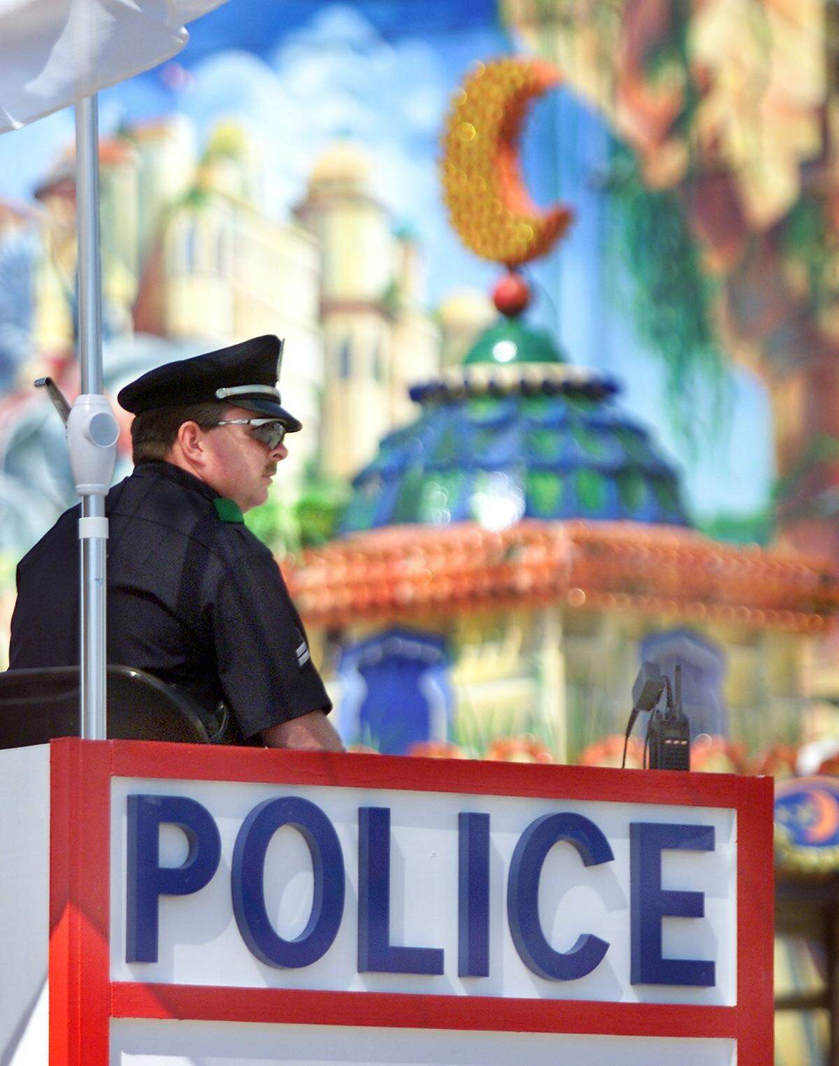 Sept. 28, 2001: State Fair of Texas officials have responded to the terrorists attacks with an increased police presence at the State Fair of Texas. Dallas police Senior Cpl. Joseph Desonier mans one of the midway booths. The fair began it’s 2001 season with great weather, plenty of entertainment and a heightened sense of security.