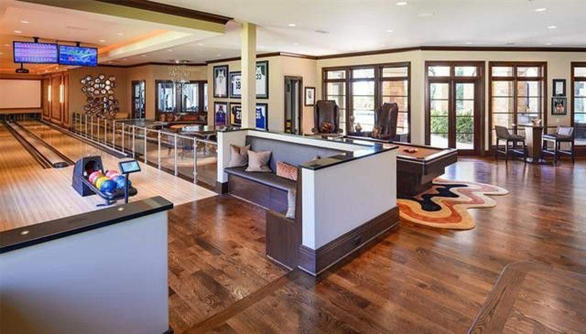 A Southlake mansion built by former NBA star Jermaine O’Neal includes a game room with bowling lanes and a billiard table.