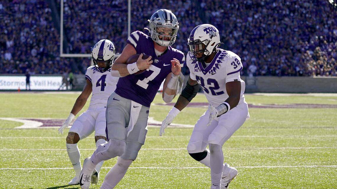 Kansas State quarterback Skylar Thompson (7) runs into the end zone to score a touchdown during the first half of an NCAA college football game against TCU, Saturday, Oct. 30, 2021, in Manhattan, Kan. (AP Photo/Charlie Riedel)