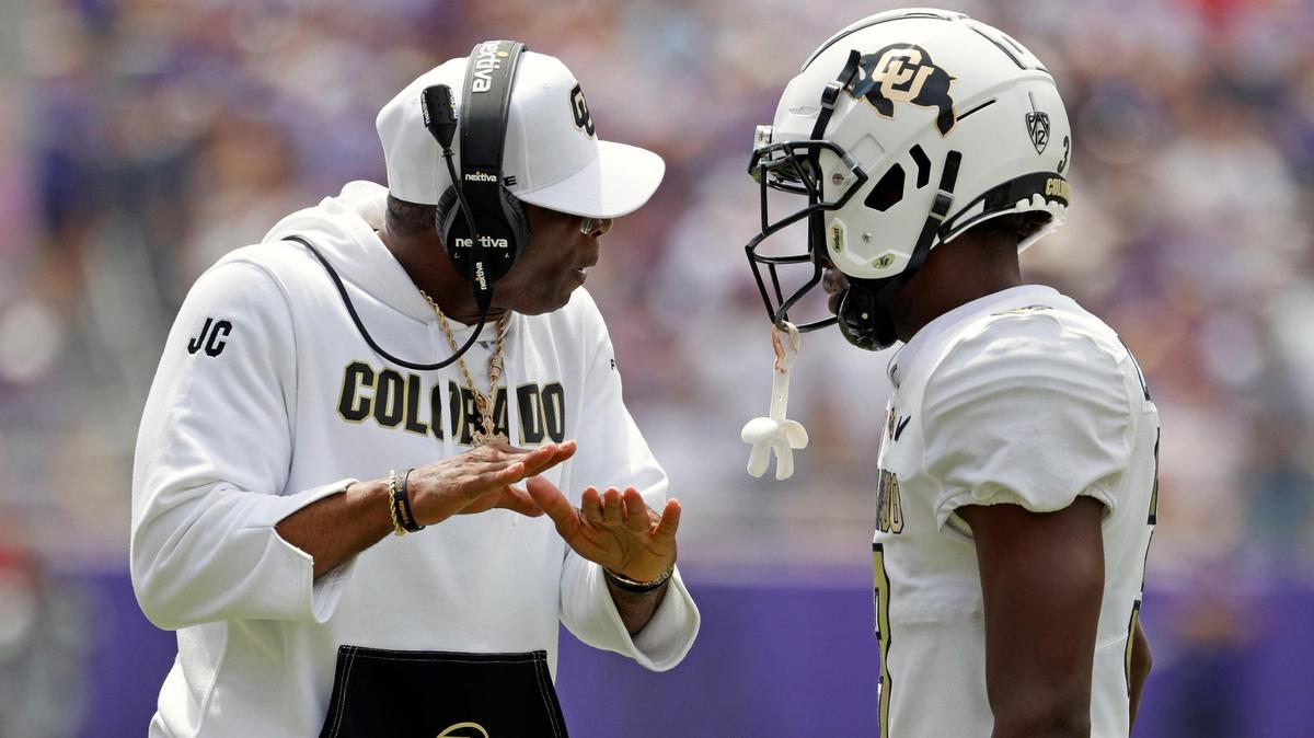 Colorado head coach Deion Sanders talks to Colorado corner back Omarion Cooper (3 in the first half of a NCAA football game at Amon G. Carter Stadium in Fort Worth,Texas, Saturday Sept. 02, 2023. Colorado led 17-14 at the half. (Special to the Star-Telegram Bob Booth)