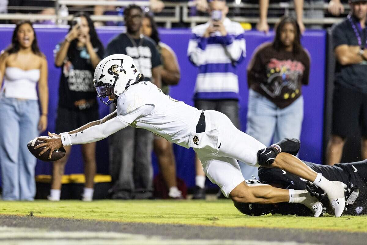 Colorado quarterback Kaidon Salter (3) dives for a touchdown in the first half of an NCAA football game between TCU and Colorado at Amon G. Carter Stadium in Fort Worth on Saturday, Oct. 4, 2025.