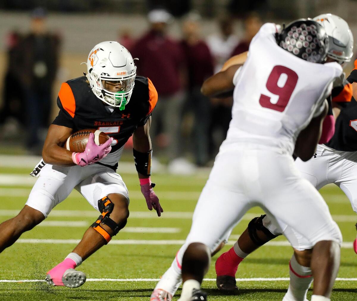 Aledo running back Ryan Williams (5) looks for a hole up the middle in a high school district 5-5A division 2 football game at Bearcat Stadium in Aledo, Texas, Friday Oct. 15, 2021. Aledo defeated Timberview 35-21. (Special to the Star-Telegram Bob Booth)