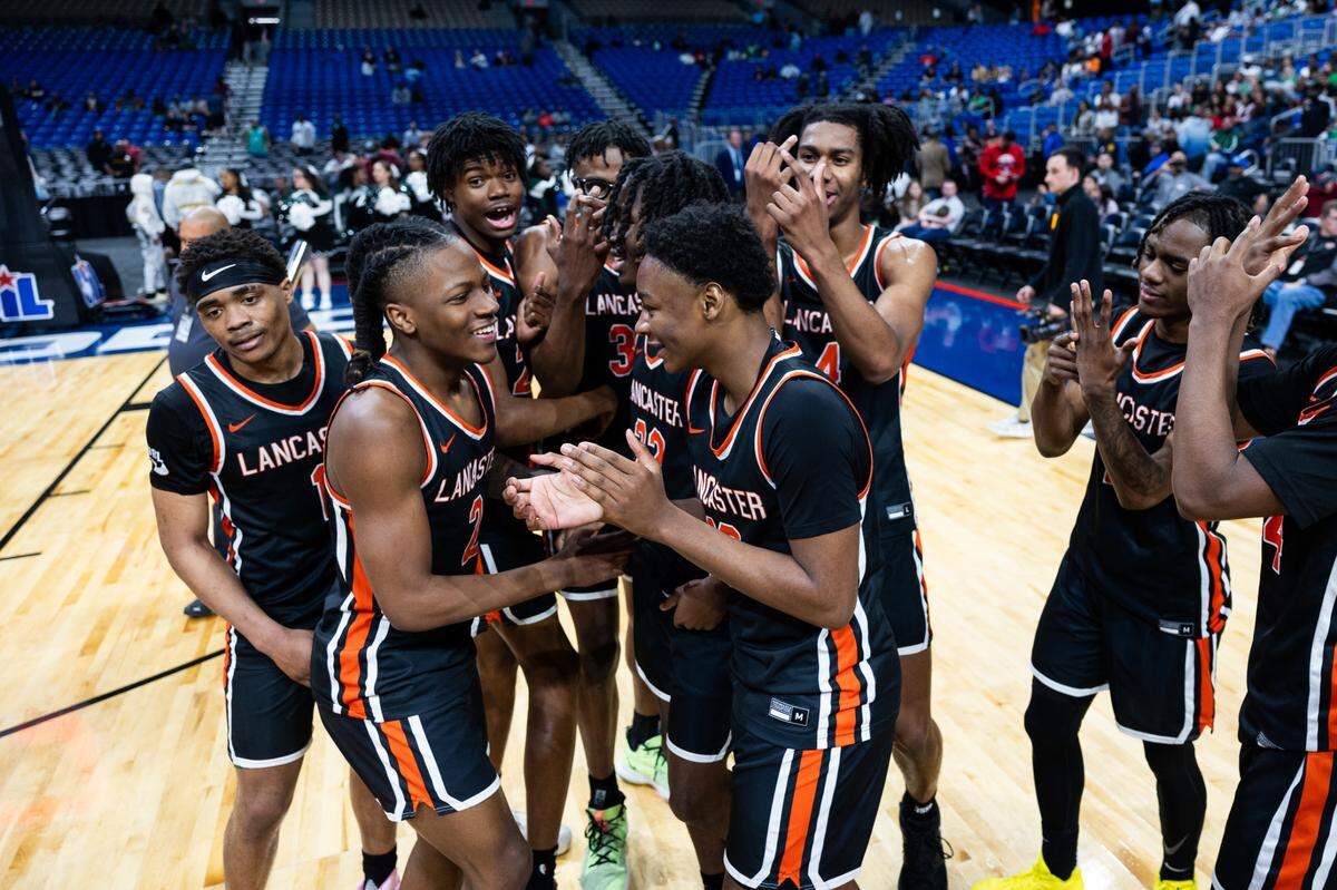 The Lancaster Tigers celebrate after winning the Class 5A state championship game on Saturday, March 9, 2024 at the Alamodome in San Antonio, Texas. Lancaster defeated Ellison 59-30.