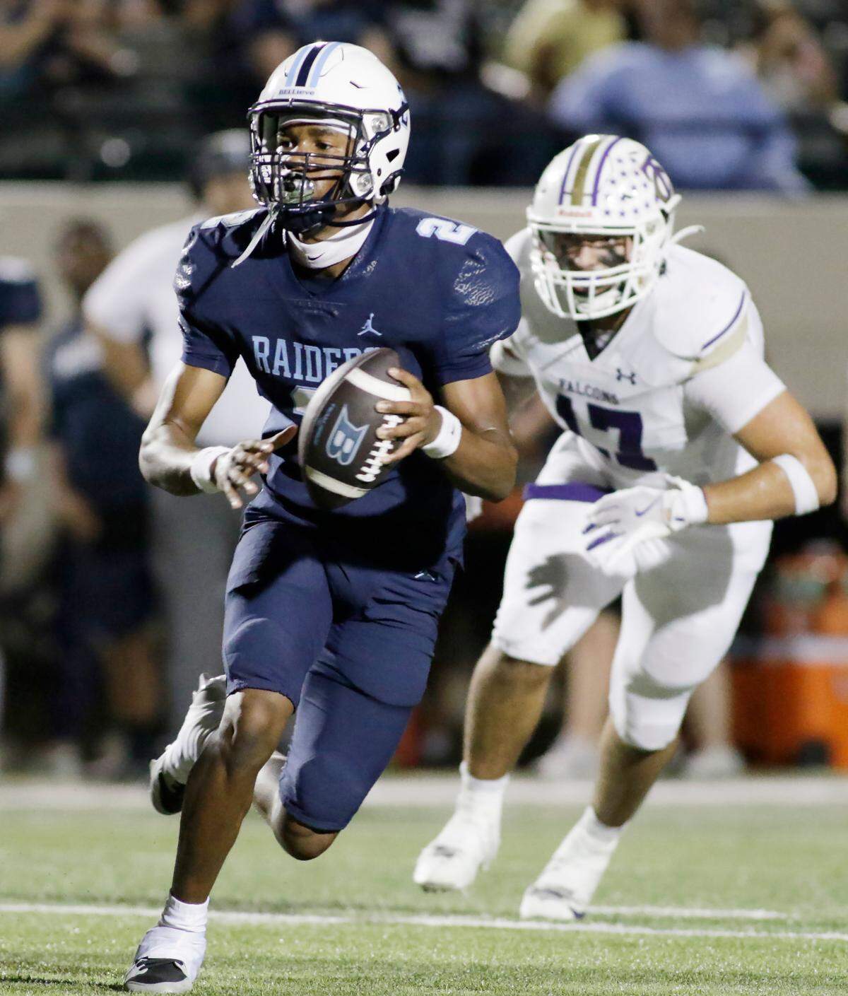 L.D. Bell’s Cameron Johnson looks for a receiver during their game UIL football game with Timber Creek Friday night at Pennington Field in Hurst on Friday Sept. 6, 2024.
