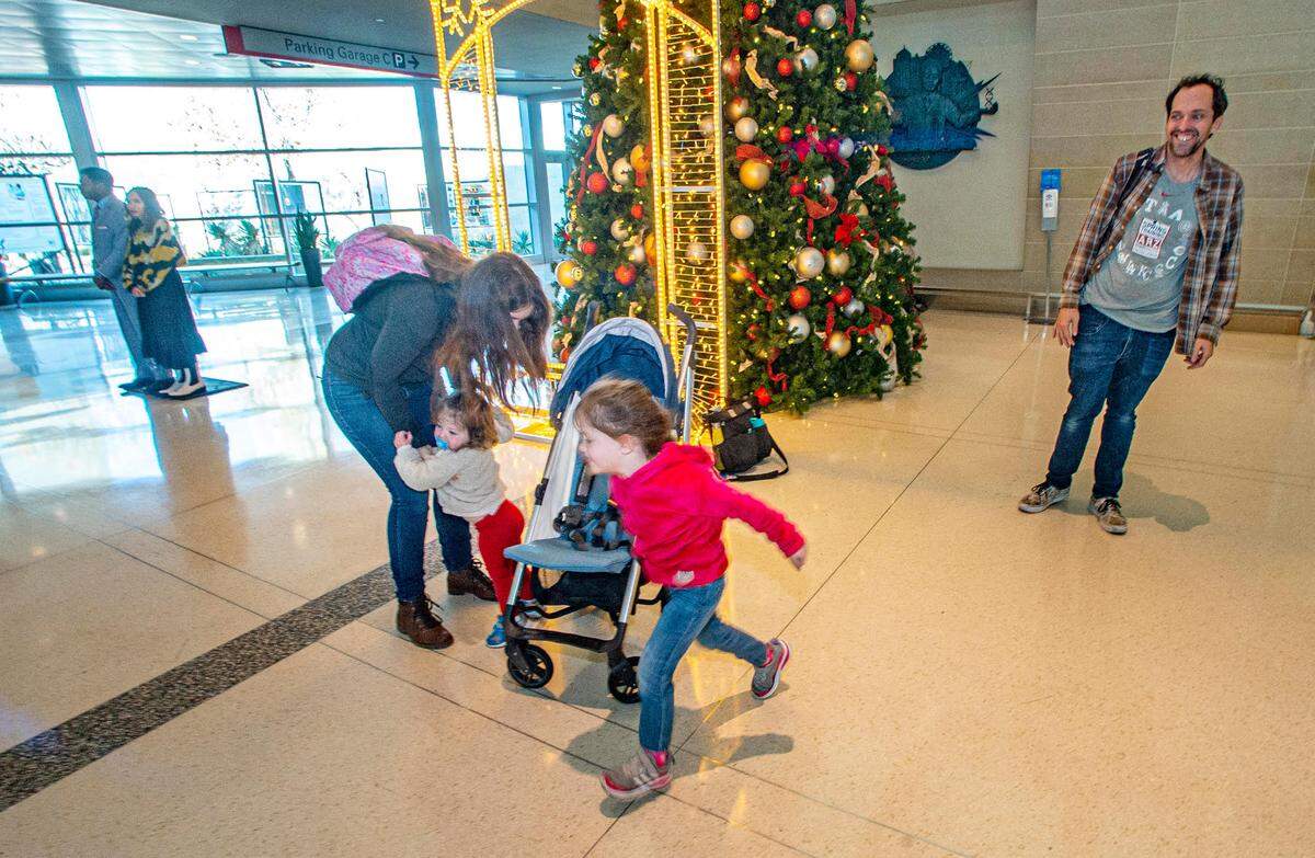 The Millericks drove from Lubbock to Dallas to make their flight to Orlando on Wednesday. From left: Kay, 18-month-old Isla, 4-year-old Mara and Sean.