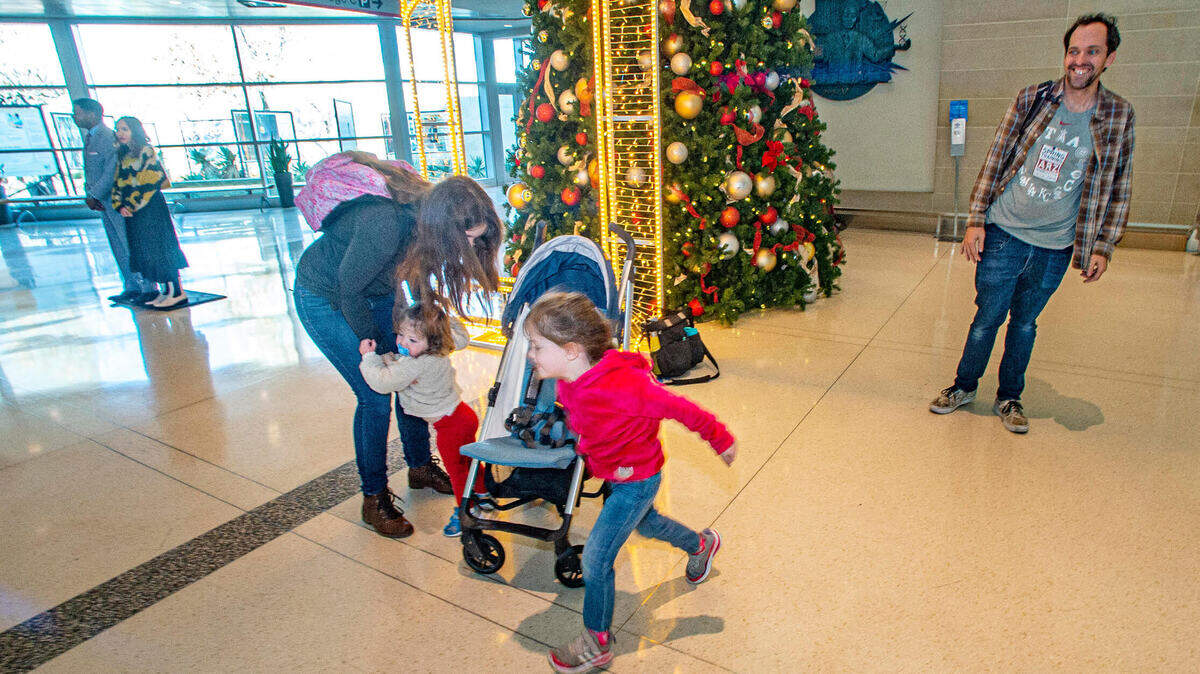 The Millericks drove from Lubbock to Dallas to make their flight to Orlando Wednesday, Dec. 28, 2022, after frigid weather forced the cancellation of their original flight. From left: Kay, 18-month-old Isla, 4-year-old Mara and Sean.