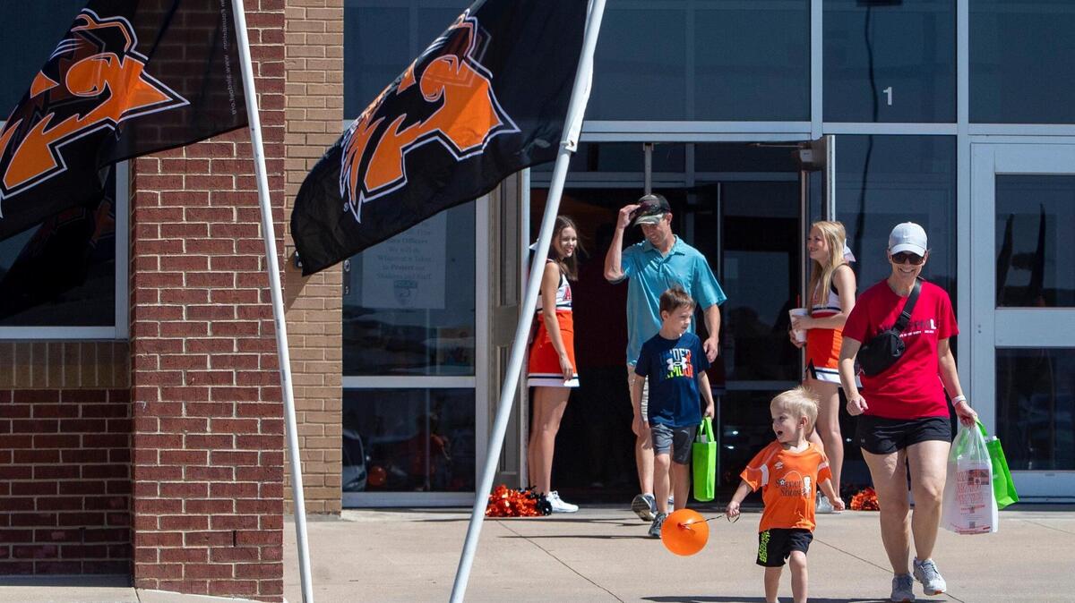 Families leave a welcome event for the new school year at Aledo High School on Saturday, Aug. 6, 2022.