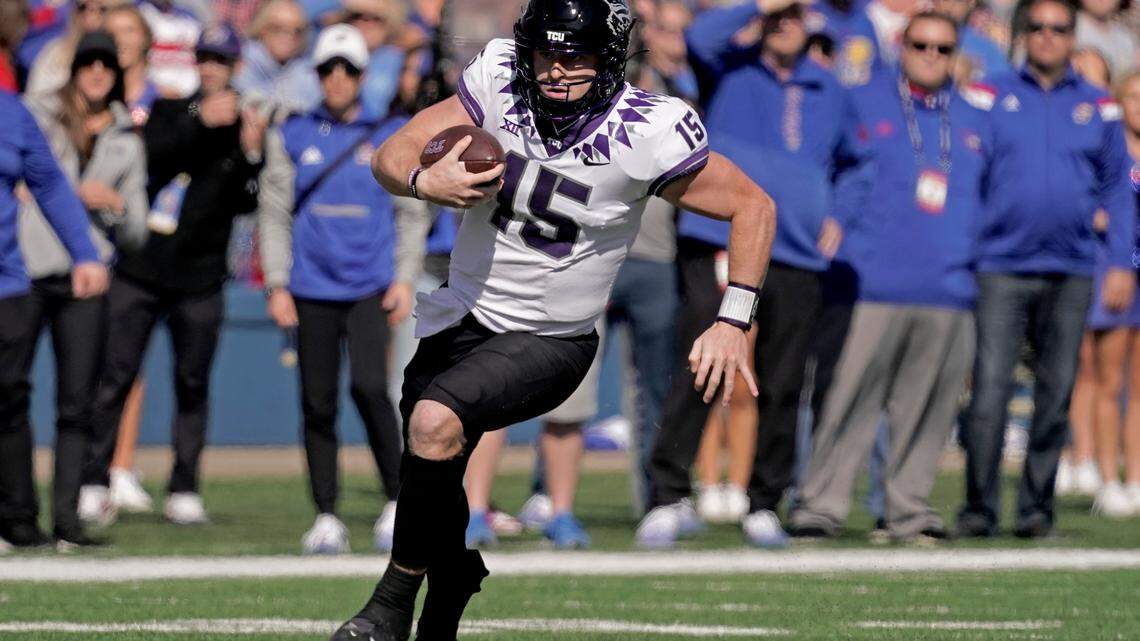 TCU quarterback Max Duggan (15) runs the ball during the first half of an NCAA college football game against Kansas Saturday, Oct. 8, 2022, in Lawrence, Kan. Duggan could have another big game against Oklahoma State’s secondary. (AP Photo/Charlie Riedel)