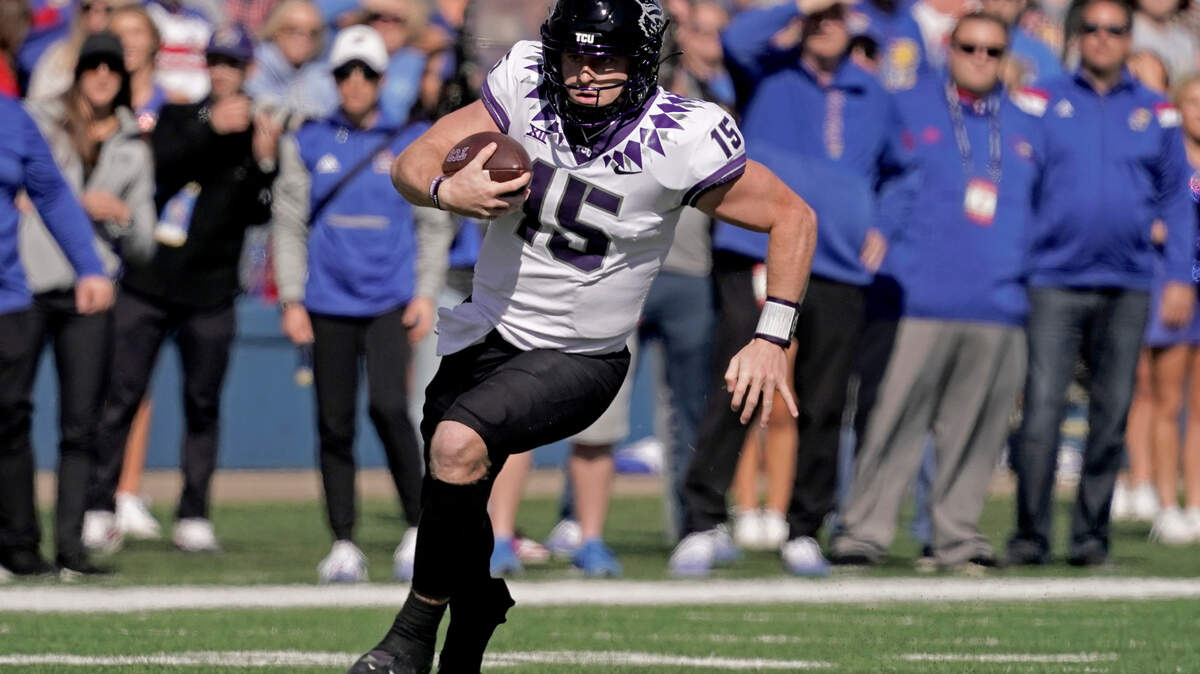 TCU quarterback Max Duggan (15) runs the ball during the first half of an NCAA college football game against Kansas Saturday, Oct. 8, 2022, in Lawrence, Kan. Duggan could have another big game against Oklahoma State’s secondary. (AP Photo/Charlie Riedel)