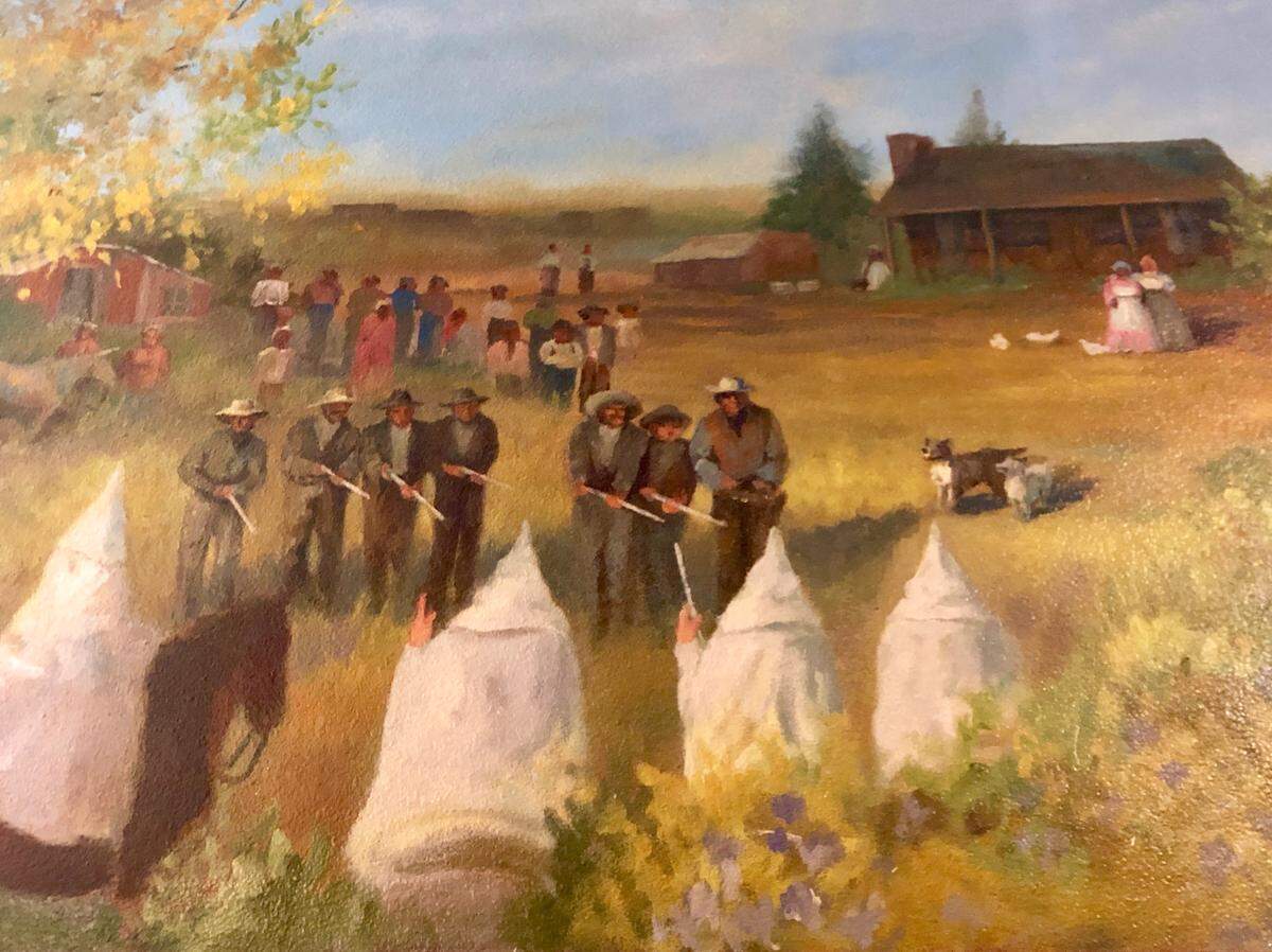 A confrontation between Ku Klux Klan like hooded riders and farmers is also shown in “The Dark Times.”