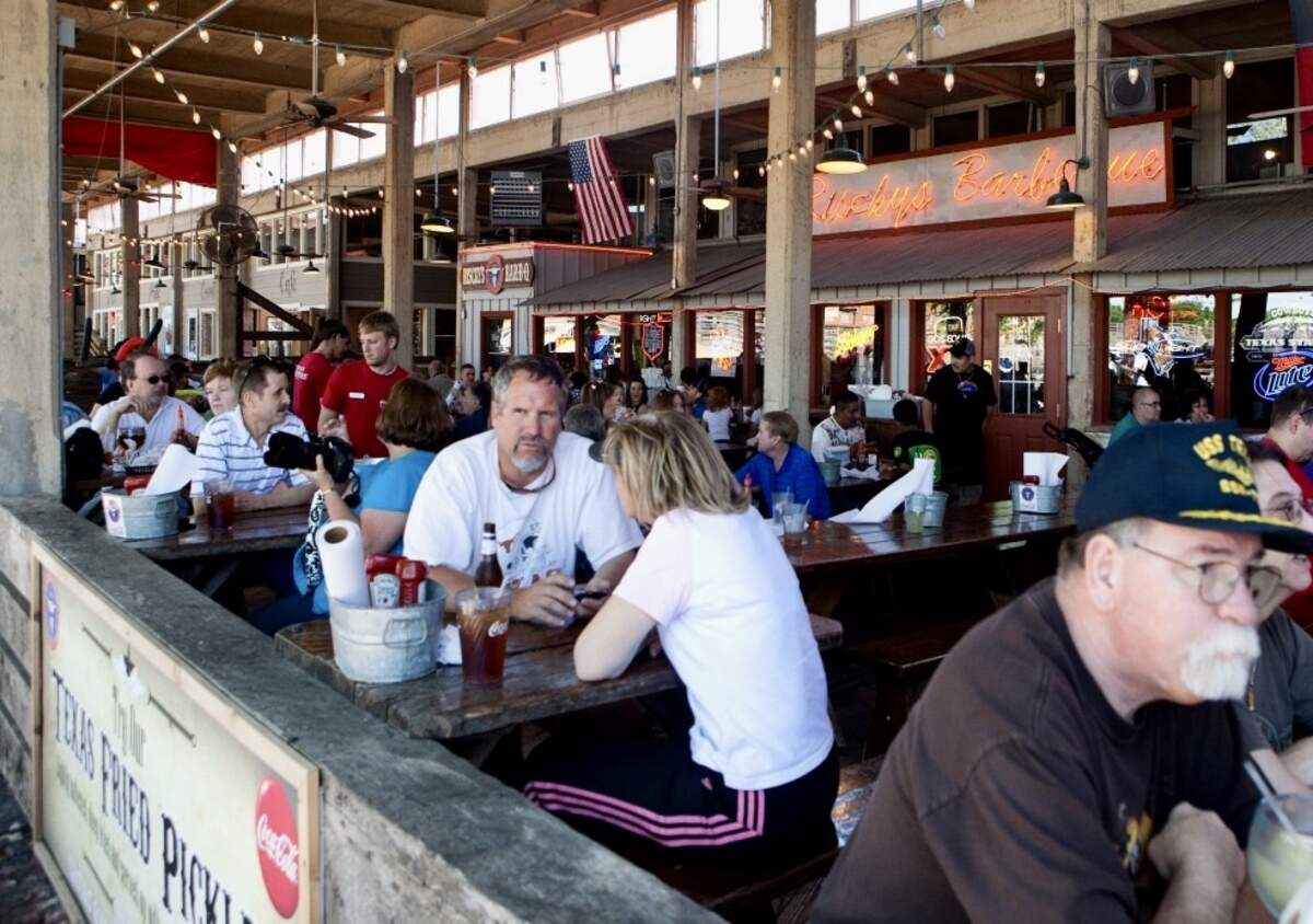 Patrons on the patio at Riscky’s in Stockyards Station.