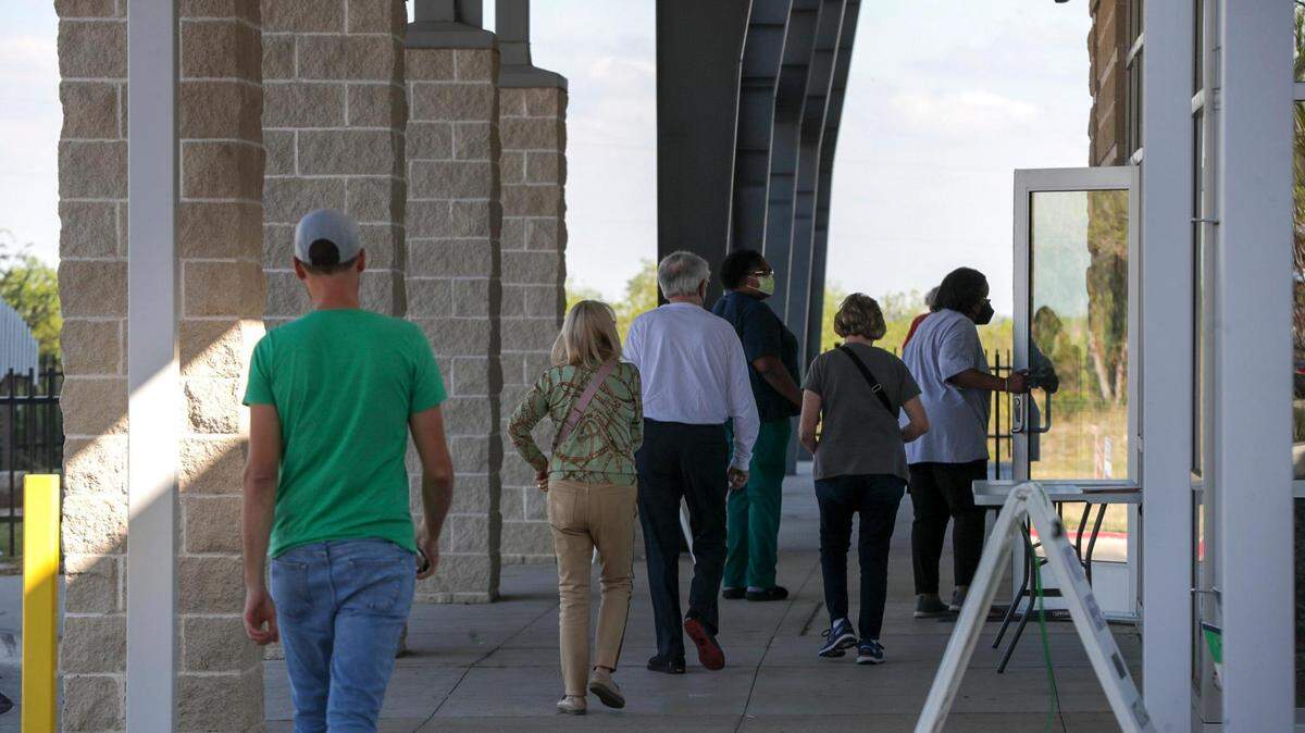 Tarrant County residents line up to vote at the Como Community Center on Wednesday. Early voting ended on Friday. Election Day is Tuesday.