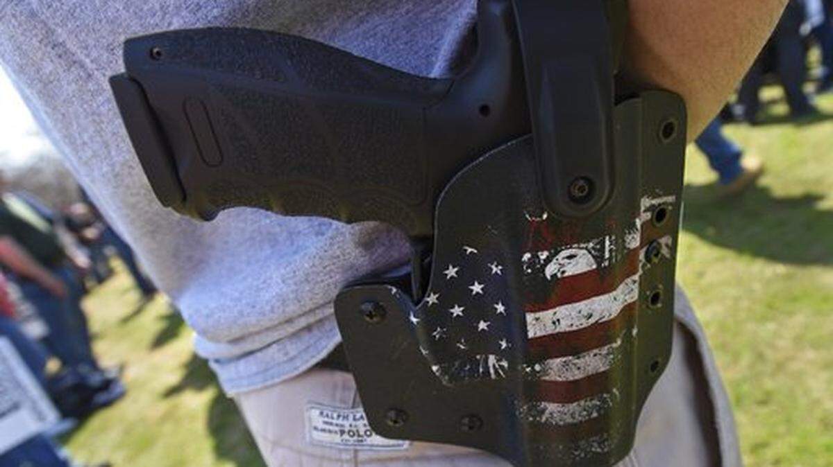 In this file photo, an attendee of the Connecticut Citizens Defense League’s “Rally for Our Rights” possesses a handgun during a rally in support of gun rights at the Connecticut State Capitol Saturday, April 14, 2018 in Hartford, Conn. The Texas Senate on Wednesday passed a permitless carry bill that would allow Texans to carry a handgun without a license.
