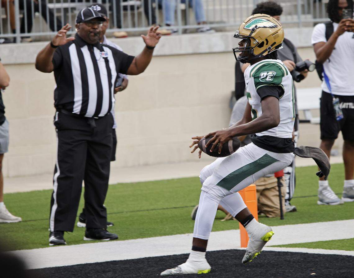 DeSoto quarterback LeMarcus Summers (15) scores for the Eagles during the first half of a UIL football game between DeSoto and North Crowley at Crowley ISD Multi-Purpose Stadium in Fort Worth, Texas, Friday, Sept. 05, 2025.