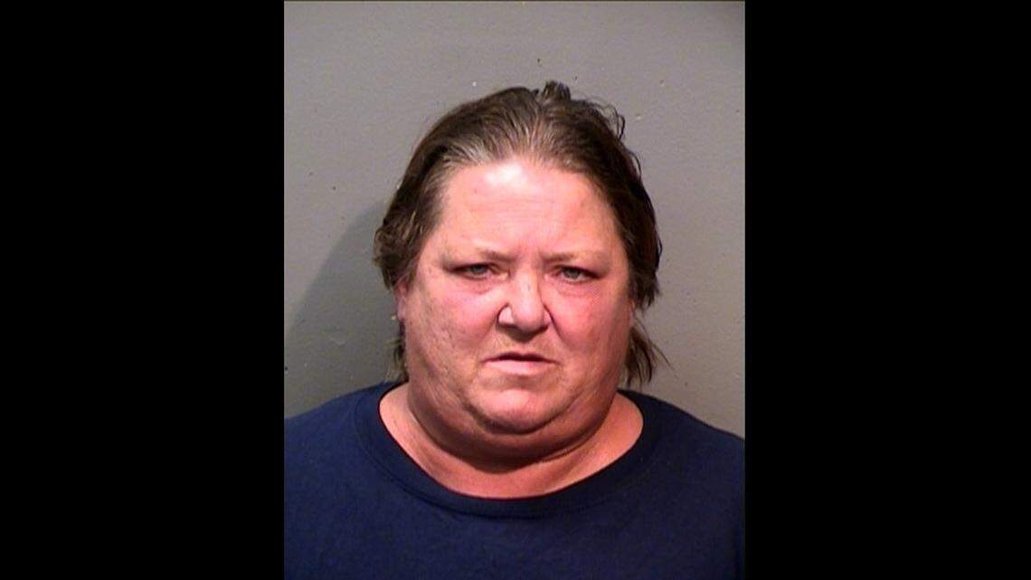 She was seen outside a bank wearing a mask on Saturday and then fled when confronted by police. But she drove for only two blocks before she stopped and was apprehended.