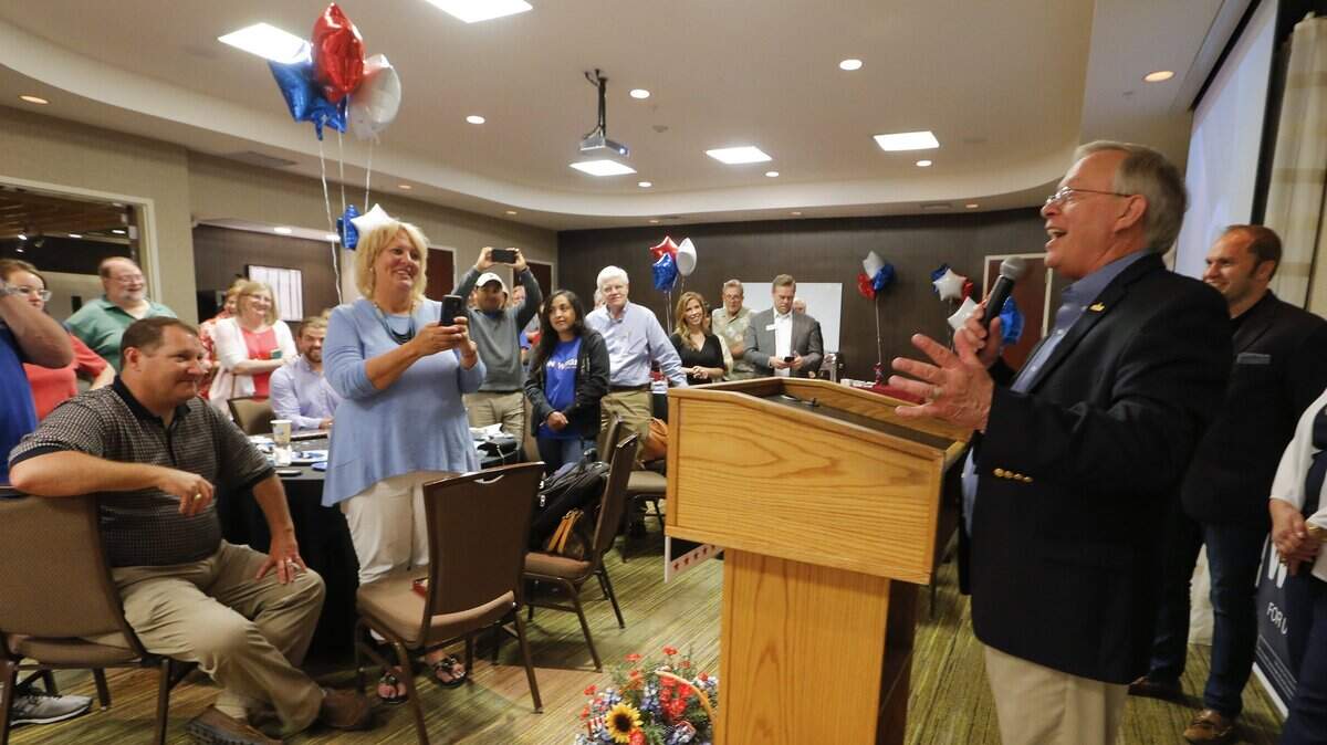 Ron Wright celebrates with supporters while winning Tuesday night's runoff for Congressional District 6.