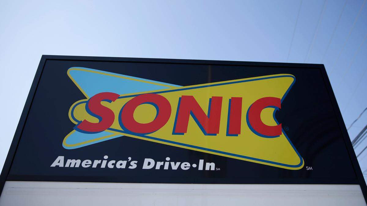 A woman is accused of attacking a carhop and a customer at a Sonic in Tulsa, Oklahoma after a dispute over her order.
