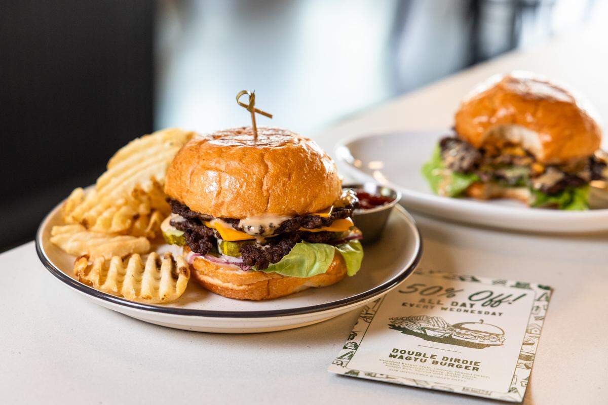 Dirdie Birdie mini golf course also offers a restaurant and full bar. Pictured here is a double smashed Dirdie Burger.