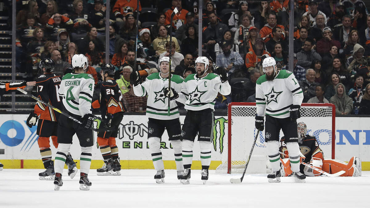 Dallas Stars’ Miro Heiskanen, left (4), celebrates his goal with teammates during the second period of an NHL hockey game against the Anaheim Ducks Wednesday, Dec. 12, 2018, in Anaheim, Calif. (AP Photo/Marcio Jose Sanchez)