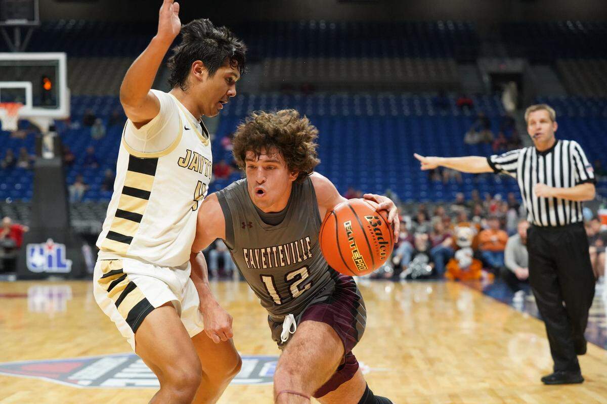 Fayetteville’s Keagan Supak (12) looks for room against Jayton in a Class 1A state semifinal on Thursday, March 7, 2024 at the Alamodome in San Antonio, Texas. Jayton defeated Fayetteville 65-26.