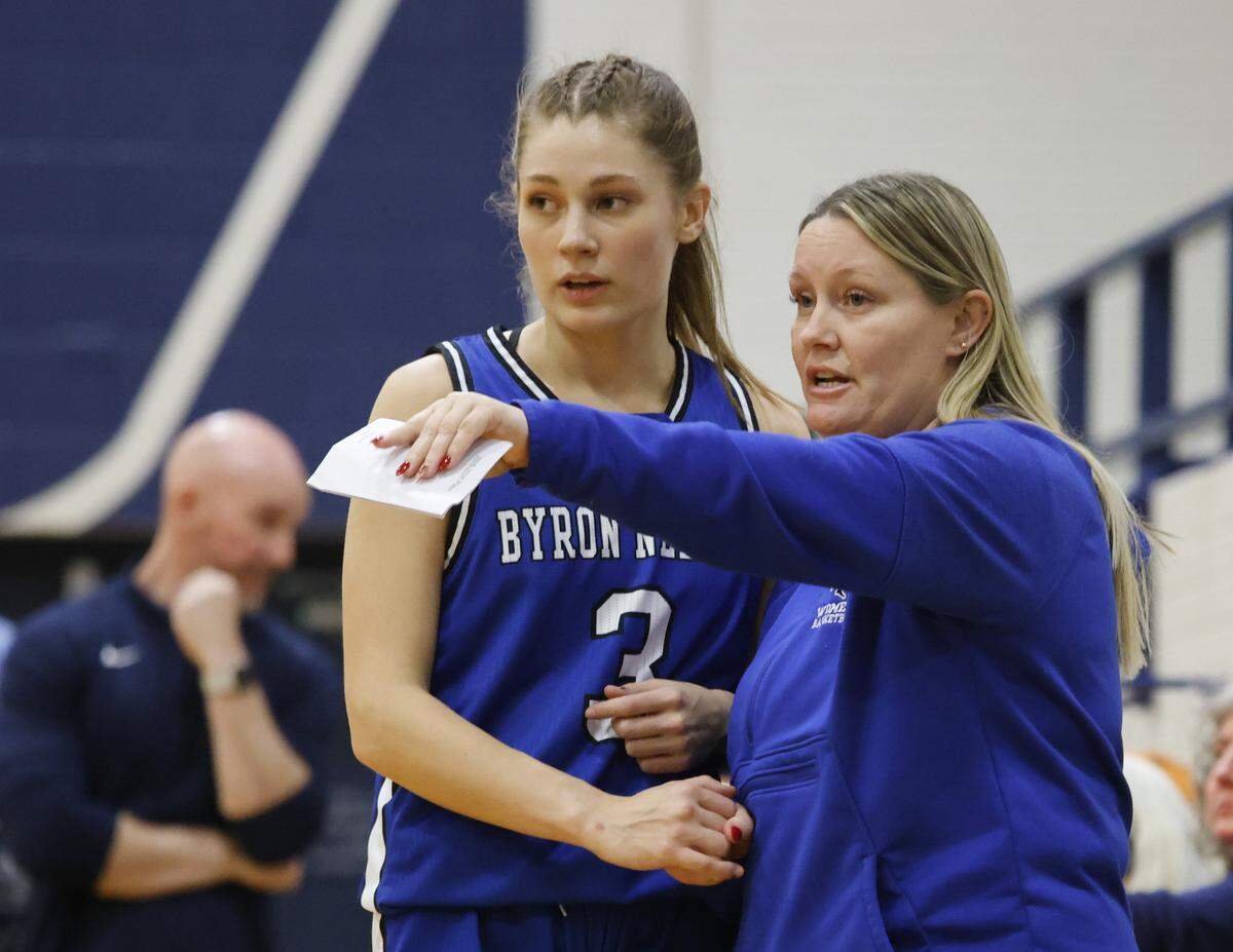 Byron Nelson head coach Tracie Robbins talks to guard Mikayla Coyle (3) on the bench during the first half of a girls UIL basketball game between Byron Nelson and L.D. Bell at L.D. Bell High School in Hurst, Texas, Friday Feb. 06, 2026